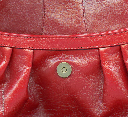  fragment of red handbag ,stitches