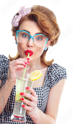 Happy woman drinking juice or cocktail