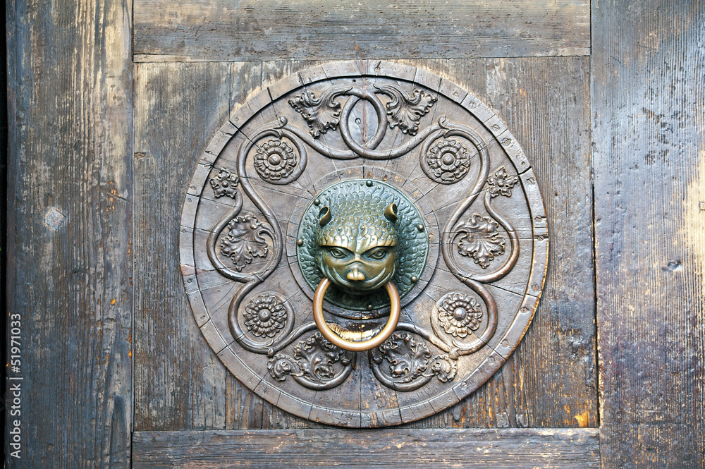 Old bronze door knocker, Cathedral of Augsburg, Germany