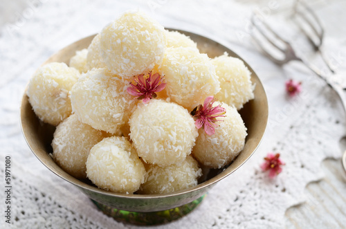 Homemade coconut bites in metal bowl