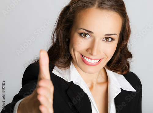 Businesswoman giving hand for handshake