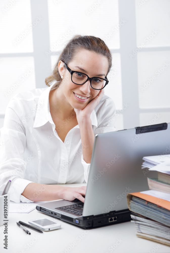 Business woman portrait in an office Business woman portrait in an office