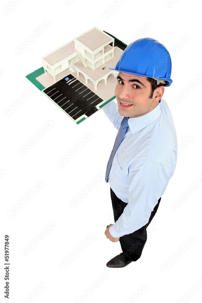 Man holding model housing Man holding model housing