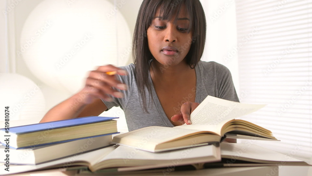 Black woman college student studying for finals Black woman college student studying for finals