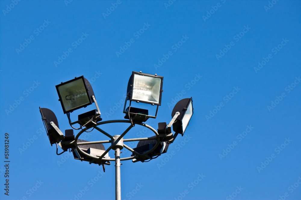electricity post with blue sky