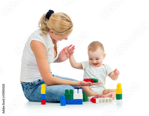 baby boy and mother playing...