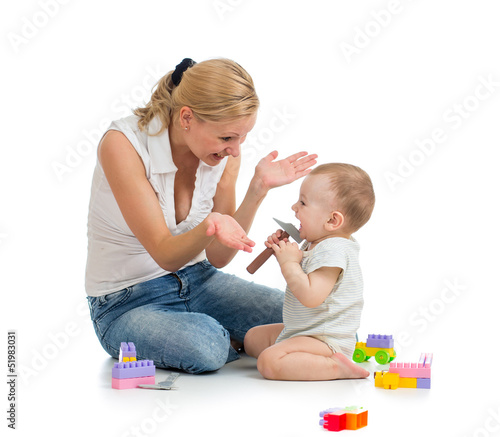 baby boy and mother playing...