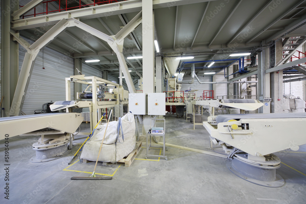 Conveyors in workshop at factory Conveyors in workshop at factory