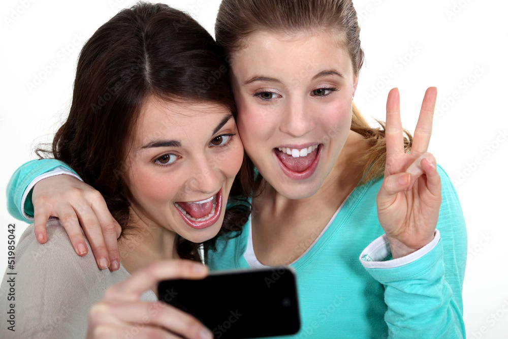 two girls taking picture of themselves two girls taking picture of themselves