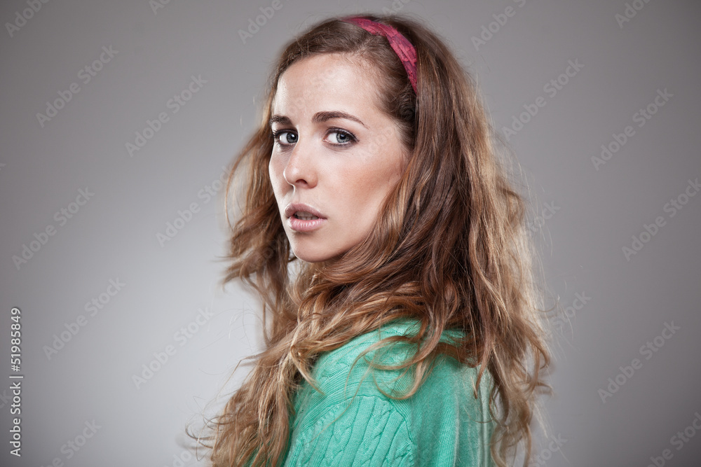 Portrait of a normal girl back and looking camera. Portrait of a normal girl back and looking camera.