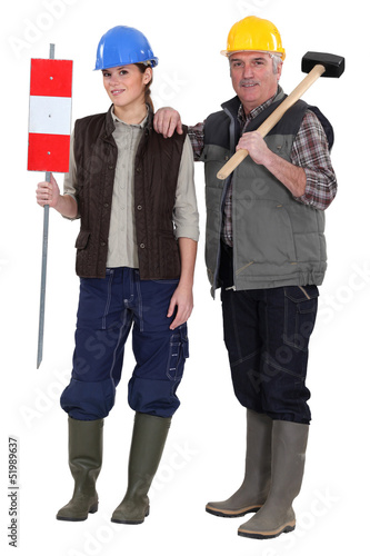 craftsman and young apprentice posing together © auremar