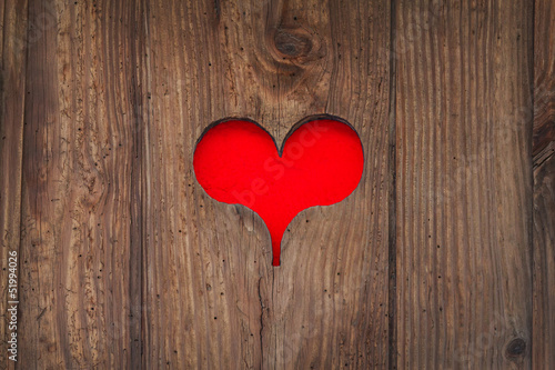 Cut out old wooden red heart shape