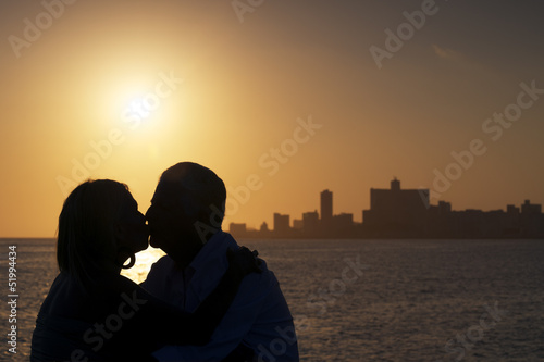 Active retired people, romantic elderly couple in love, kissing