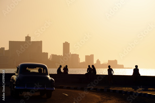 People and skyline of La Habana, Cuba, at sunset © Diego Cervo