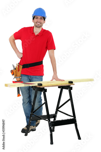 carpenter cutting wood © auremar