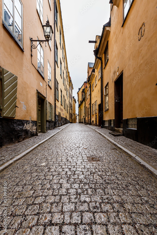 Fototapeta premium Narrow Street in Old Town (Gamla Stan) of Stockholm, Sweden