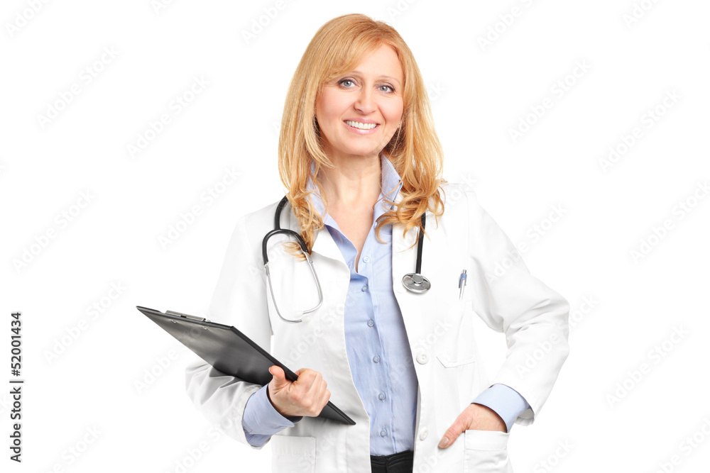 A mature healthcare professional with clipboard posing A mature healthcare professional with clipboard posing