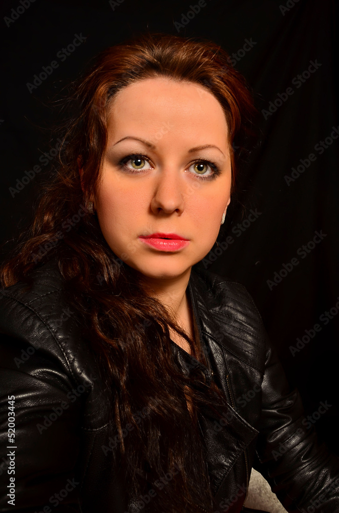 portrait of a girl on a black background