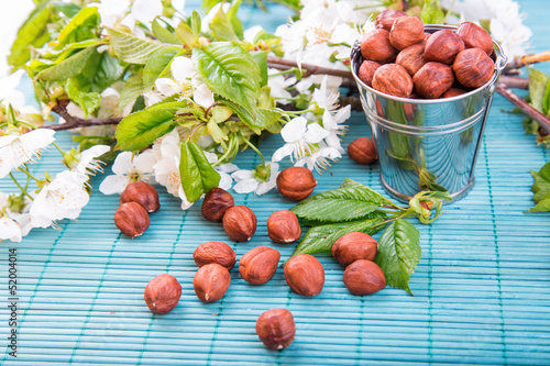 Hazelnuts in a backet photo