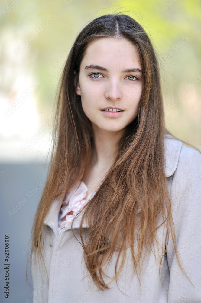 Beautiful kind girl portrait outdoor - close up Beautiful kind girl portrait outdoor - close up