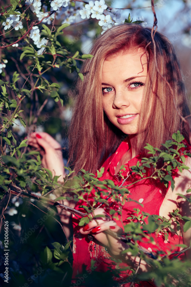 Girl in the flowers of cherry Girl in the flowers of cherry