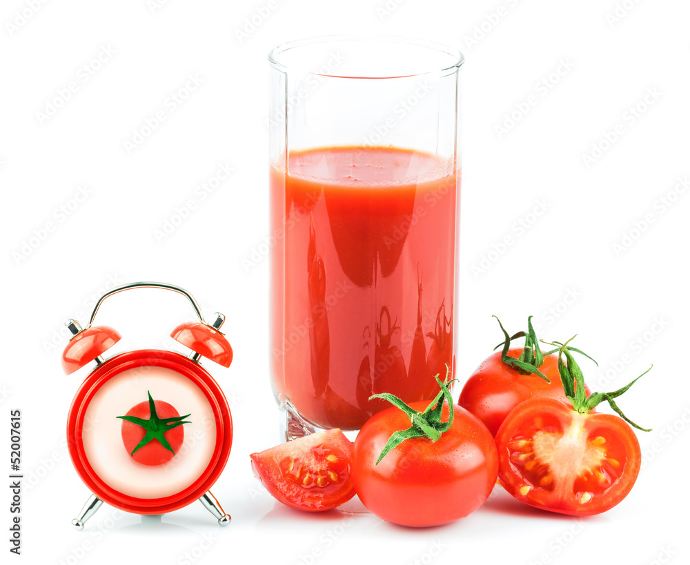 Concept with tomato juice, red clock and tomato Concept with tomato juice, red clock and tomato