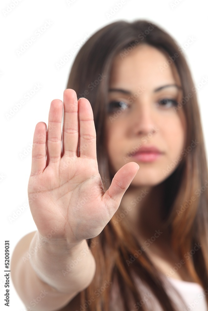 Woman making stop gesture with her hand Woman making stop gesture with her hand