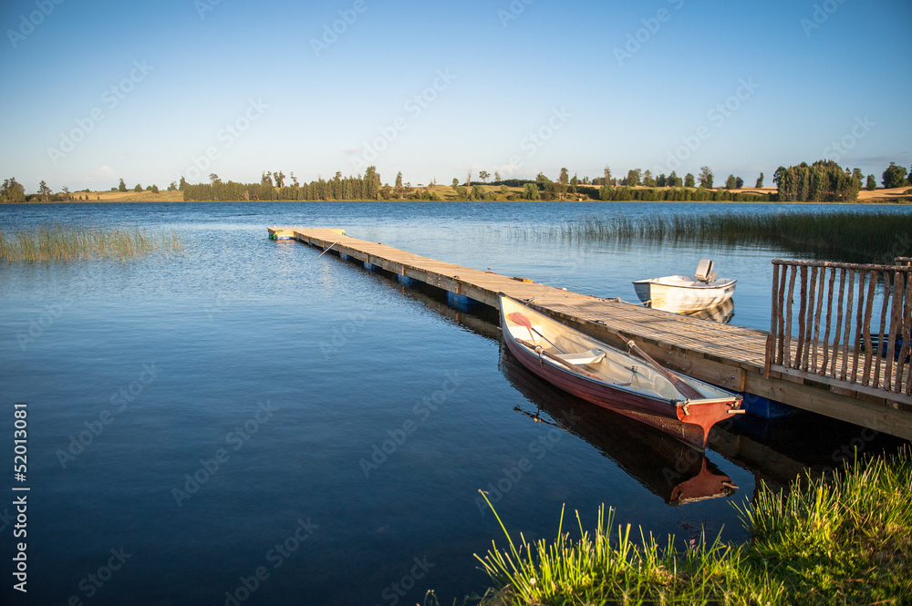 Boat at the lake in a gorgeous landscape