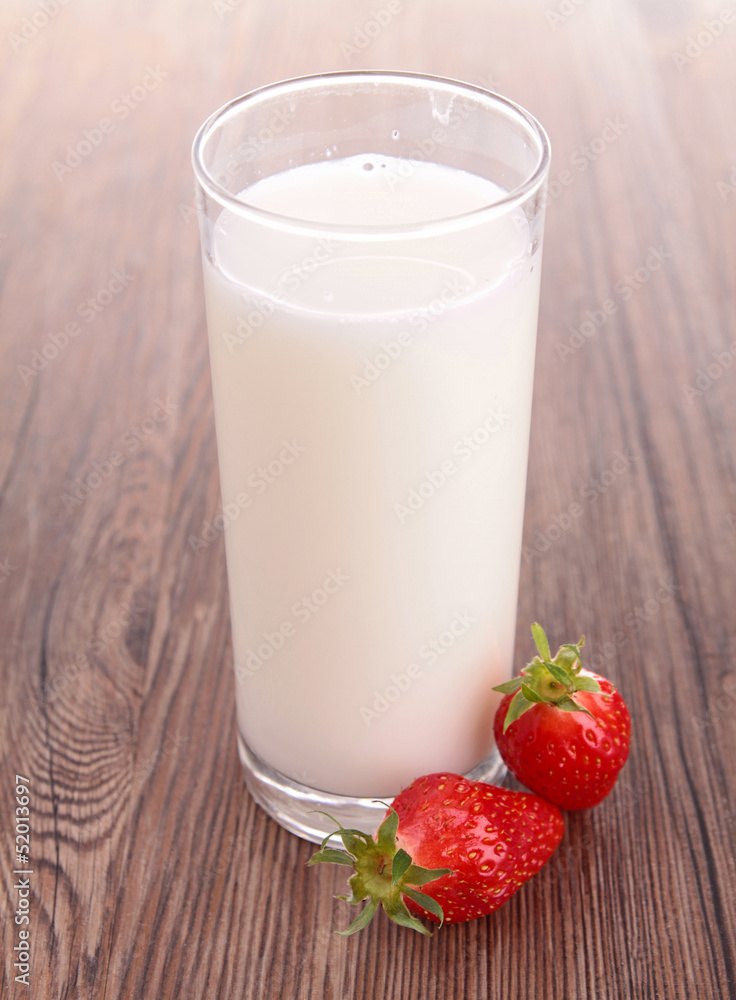 glass of milk and strawberry glass of milk and strawberry