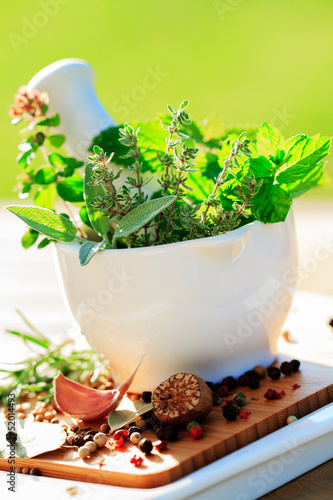 Fresh herbs in the mortar - healthy food