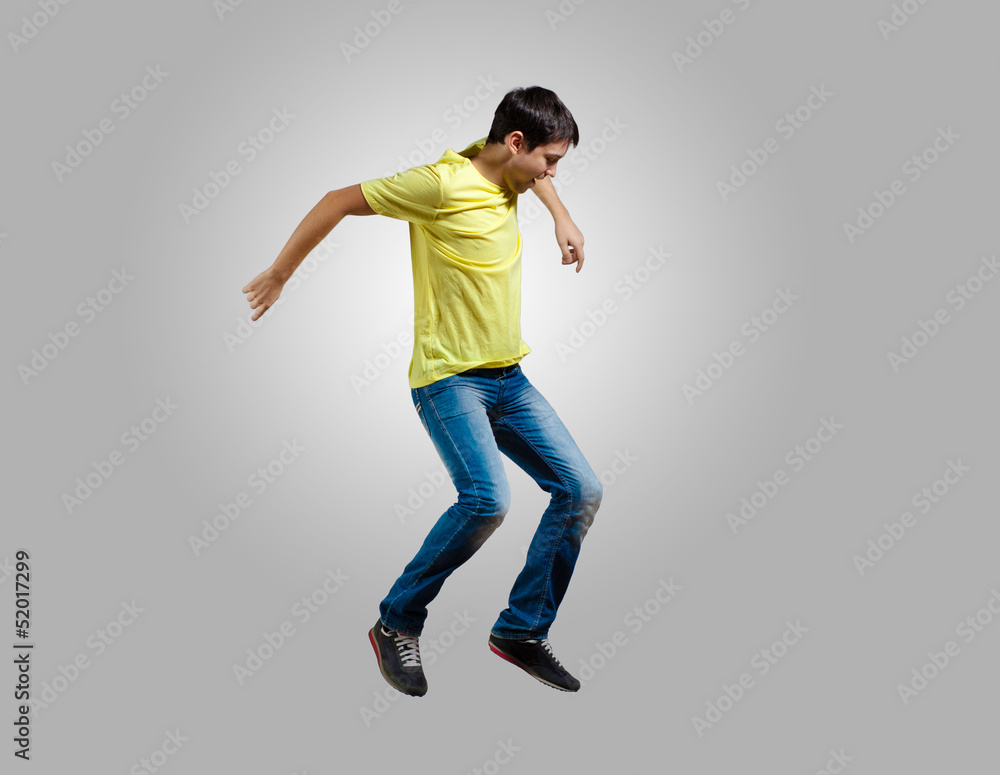 Young man dancing and jumping Young man dancing and jumping