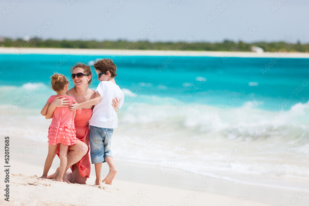 Family enjoying beach vacation