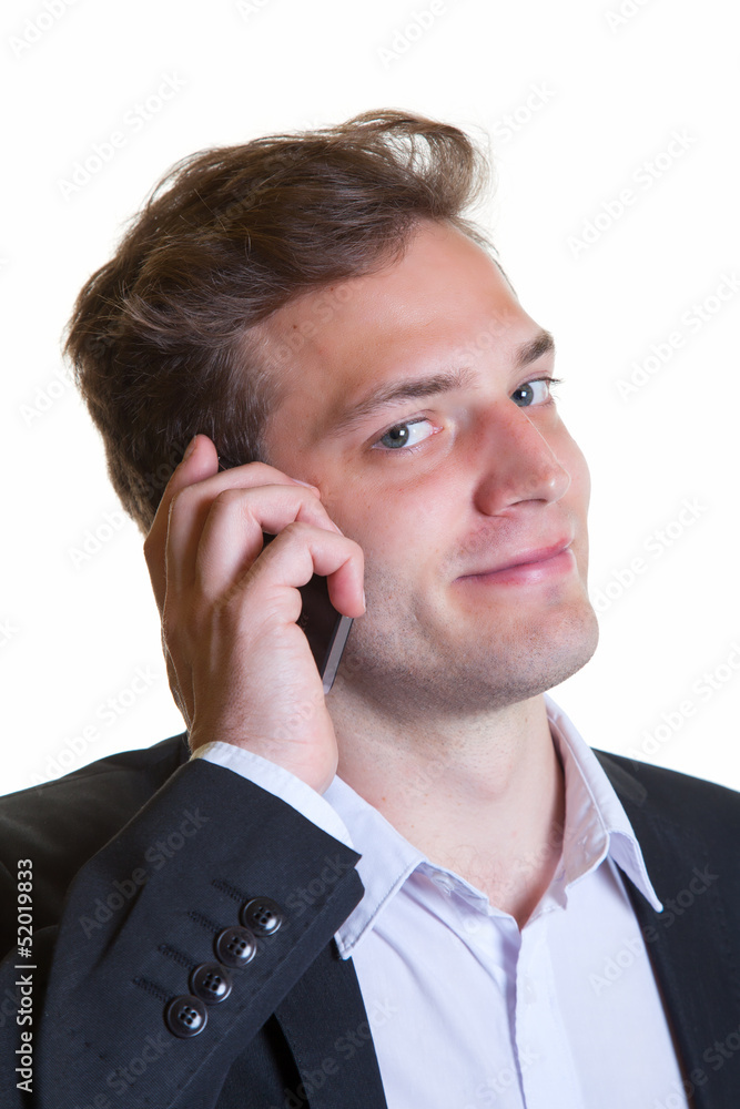 Junger Mann freut sich am Telefon Junger Mann freut sich am Telefon