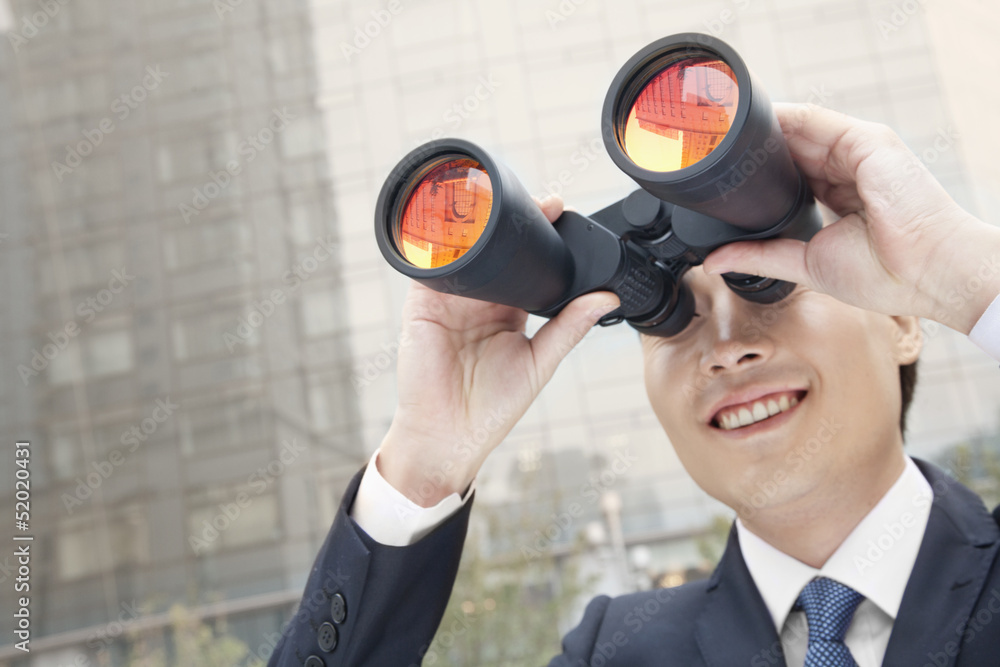 Smiling Businessman Using Binoculars, Reflection Smiling Businessman Using Binoculars, Reflection