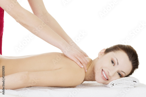 Preaty woman relaxing beeing massaged in spa