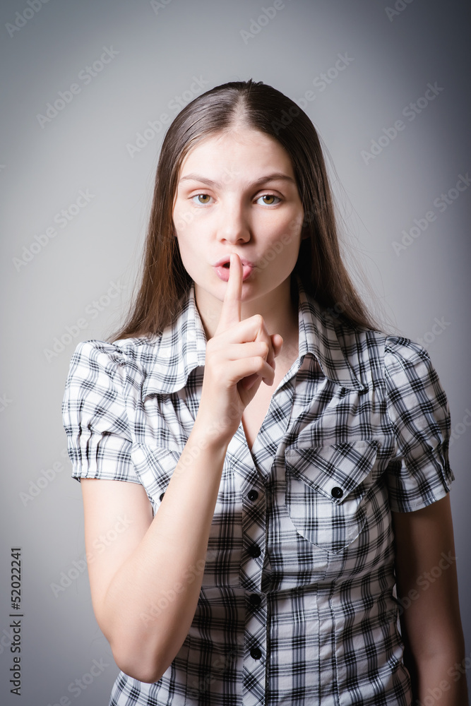Girl holding a question mark Girl holding a question mark