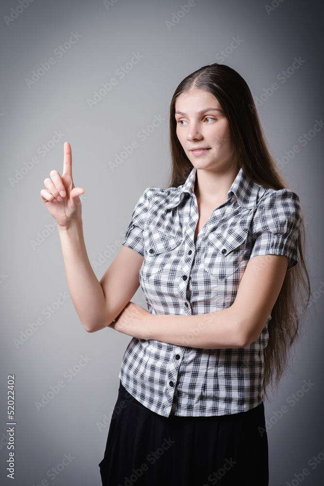 girl shows a finger girl shows a finger