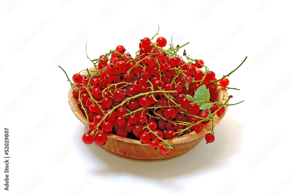 Fototapeta premium Red currants in the plate isolated on white
