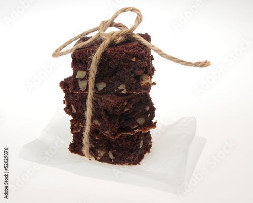 chocolate and almond cake tied up with cord