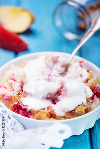 Rice pudding with applem raspberry and cinnamon