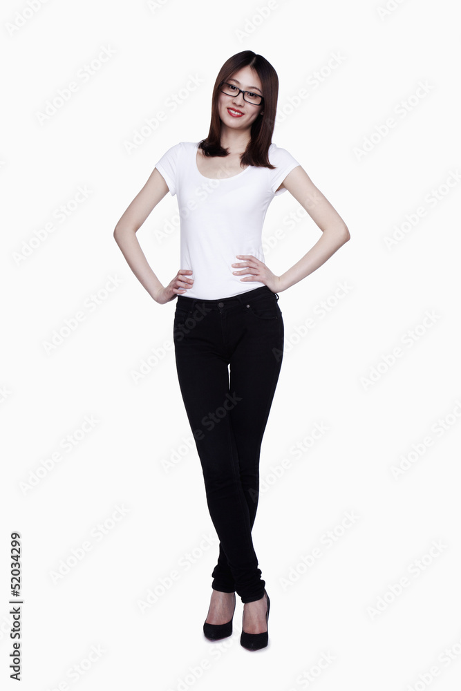 Fototapeta premium Young confident woman looking at camera