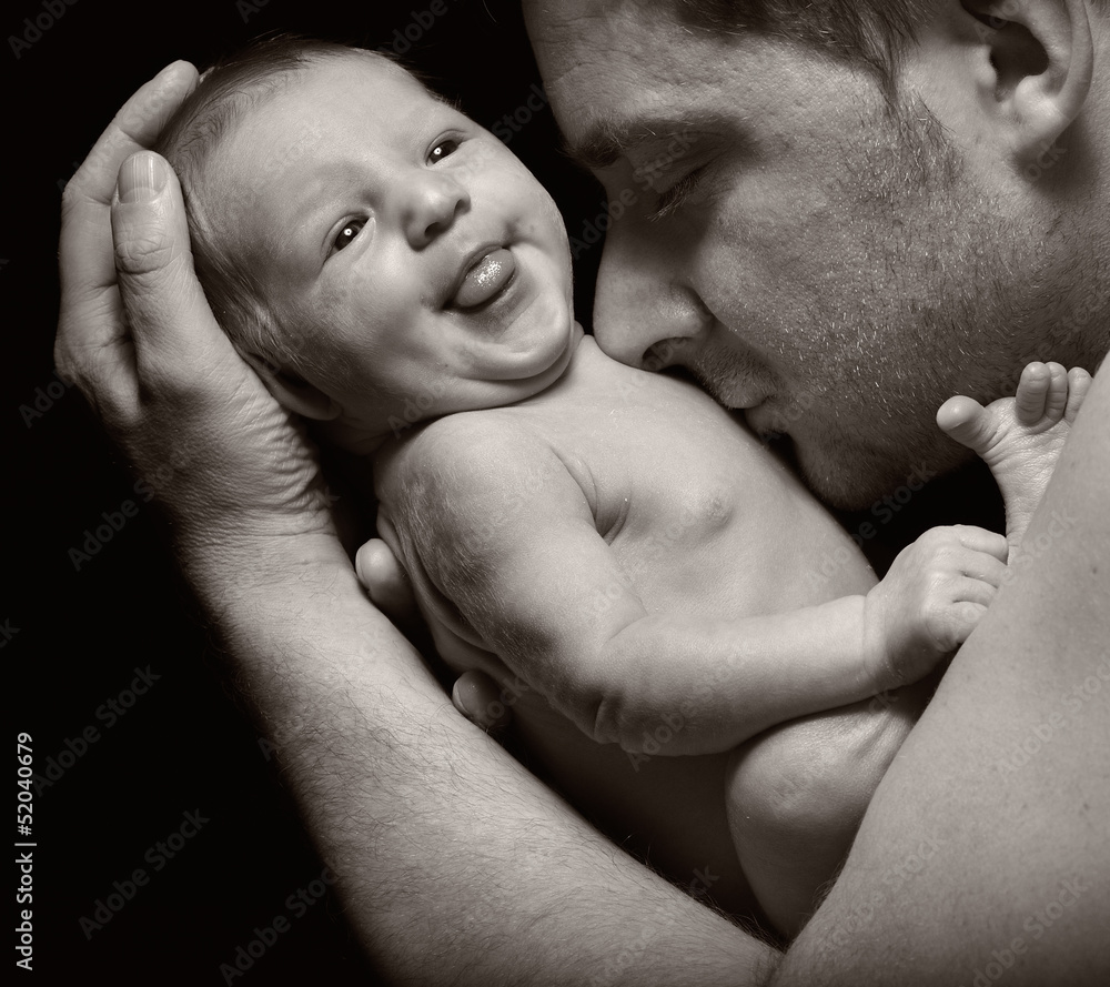 Father and his newborn baby.