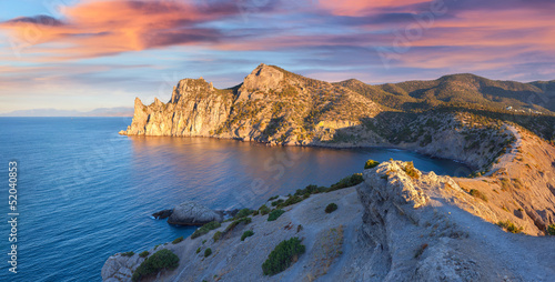 Colorful summer sunrise on the sea. Royal bay, Novy Svet, Cremea photo