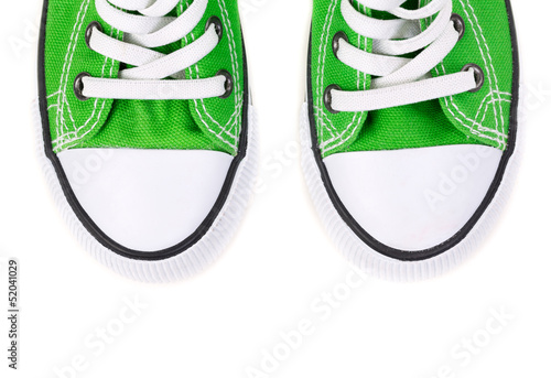 front of the green sneakers