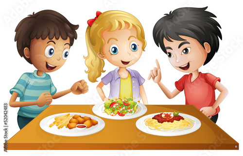 Kids watching the table with foods