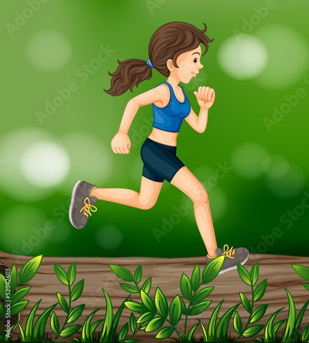 A woman running above a wood with leaves