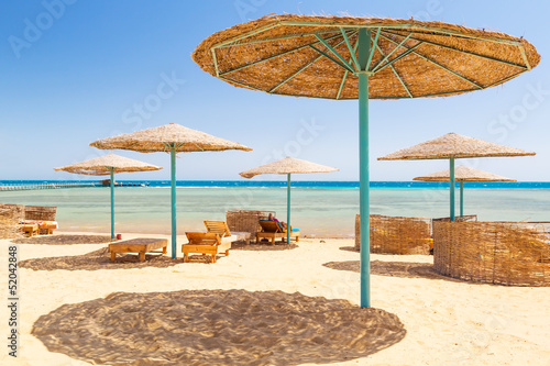 Relax under parasol on the beach of Red Sea  Egypt