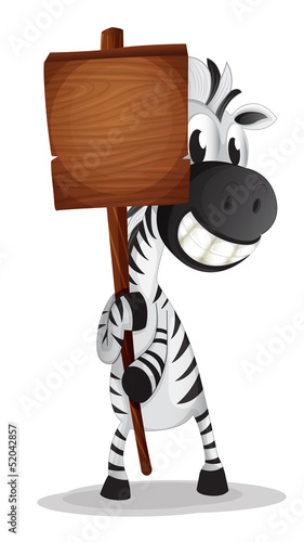 A zebra holding an empty wooden signboard