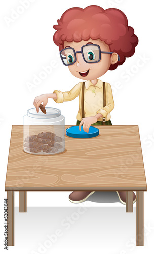 A boy putting chips in the jar