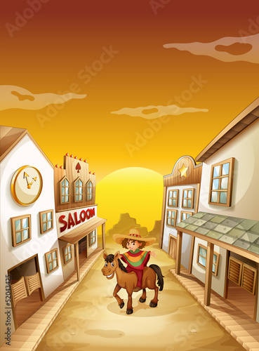 A boy riding in a horse outside the saloon